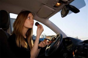 photo of driver applying makeup