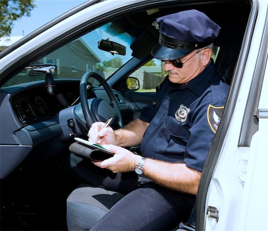 police%20writing%20ticket.jpg