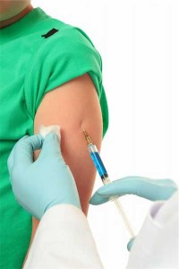 Flu shots: photo of medical person administering vaccine to patient