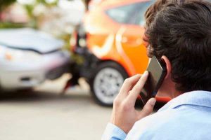 Car accident victim on phone