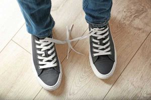 sneakers tied together - when pranks cause injury of damage