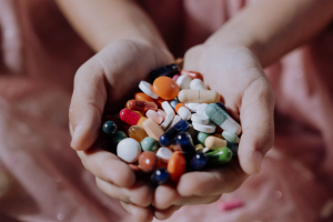 Handful of colorful prescription pills -- Drug Take Back Day helps keep prescription drugs out of the wrong hands.